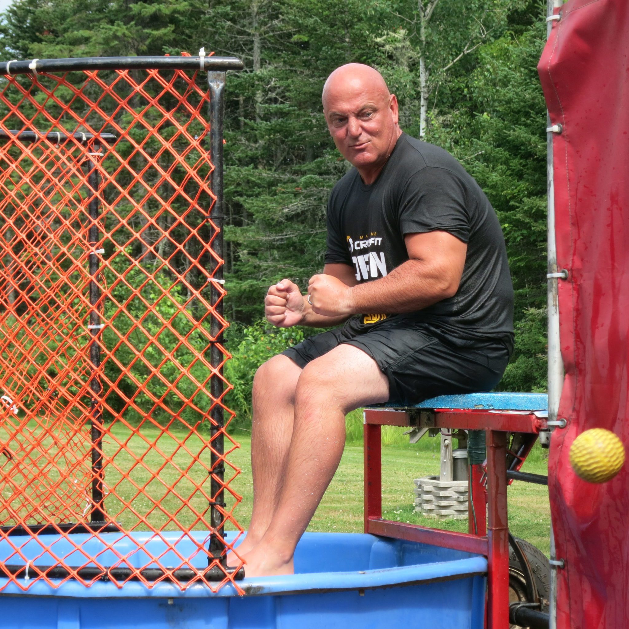 Tim getting dunked for charity